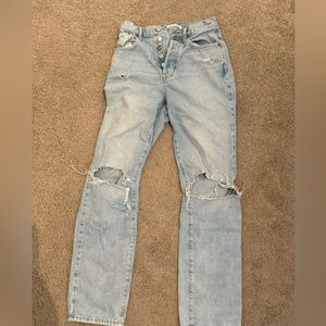 light blue ripped jeans